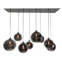 Hanglamp voor boven de eettafel met bollen van smoke glas 